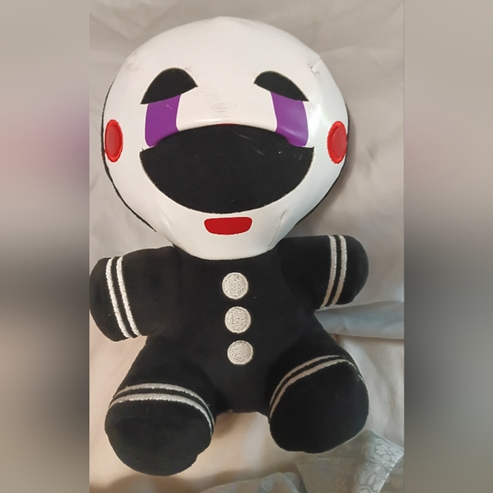Charming Black and White Puppet Plush with Red and Purple Accents